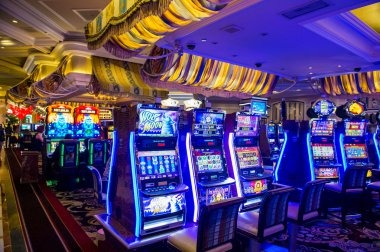Live dealer blackjack table with professional dealer and multiple player cards displayed on screen